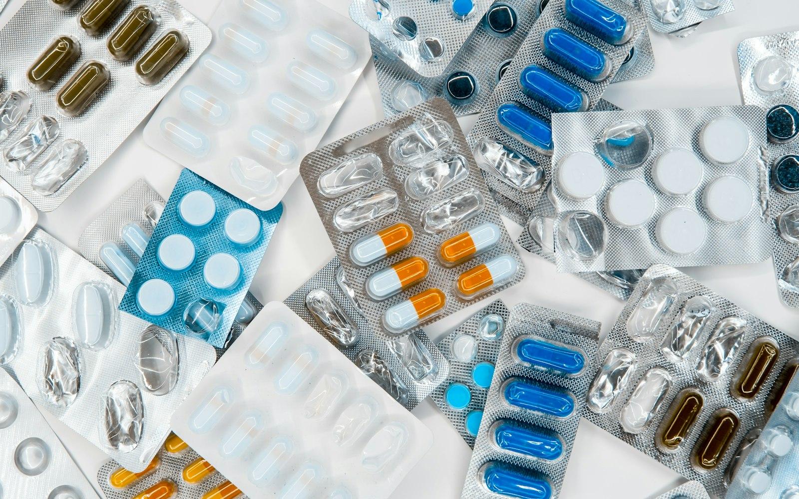 Pharmaceutical capsules arranged on a tabletop